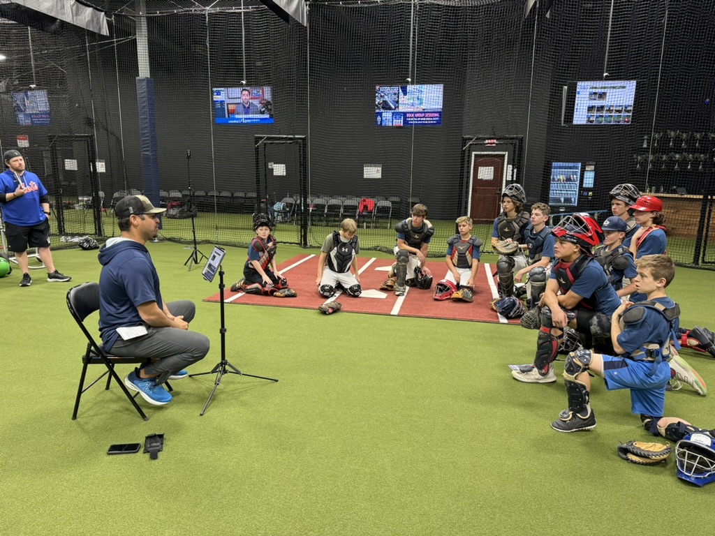 Catchers working through drills at a Florida Baseball Ranch boot camp